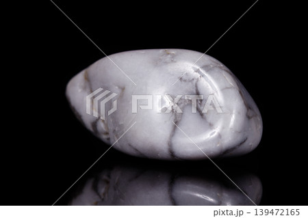 Macro mineral stone Magnesite on black background Macro mineral stone Magnesite on black background 139472165