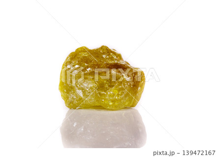 Macro mineral stone Green pomegranate on white background Macro mineral stone Green pomegranate on white background 139472167