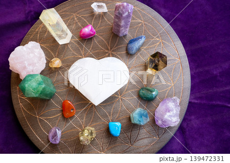 Healing crystals on brown background 139472331