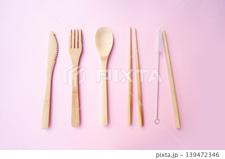 Zero waste concept, reusable eco-friendly straw and wooden cutlery Zero waste concept, reusable eco-friendly straw and wooden cutlery 139472346