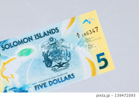 Solomon Islands five dollars polymer currency bill from 2019 issued Bank of Solomon Islands 139472893