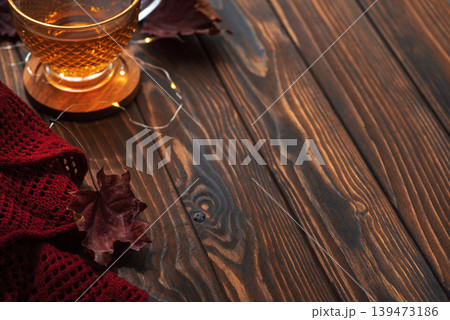 Autumn flat lay with warm tea and fall decorations Autumn flat lay with warm tea and fall decorations 139473186
