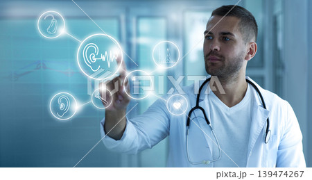 Digital hearing treatment concept. Doctor touching holographic screen with hearing icons. hearing exam and treatment 139474267
