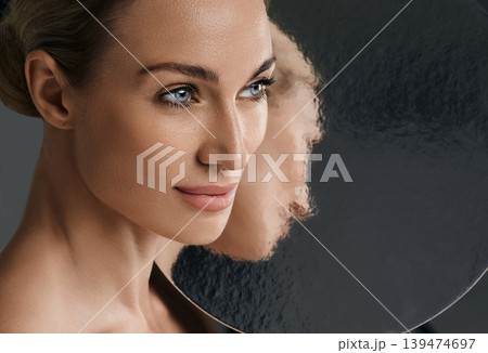 Beauty portrait of woman with perfect and shiny skin. Concept of skin care and aesthetic cosmetology, high quality Beauty portrait of woman with perfect and shiny skin. Concept of skin care and aesthetic cosmetology, high quality 139474697