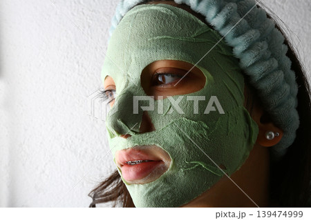 Teen Girl with Facial Mask Skincare Routine Teen Girl with Facial Mask Skincare Routine 139474999