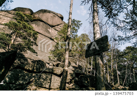 Landscape of Siberia mountains Stolbi, rock peak range in haze summer 139475703