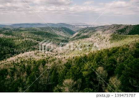 Landscape of snowy Siberia Krasnoyarsk mountains, mountain range in haze summer Landscape of snowy Siberia Krasnoyarsk mountains, mountain range in haze summer 139475707