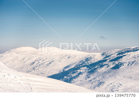 Landscape of snowy Sheregesh mountains, mountain range haze winter Bird eye view 139475770