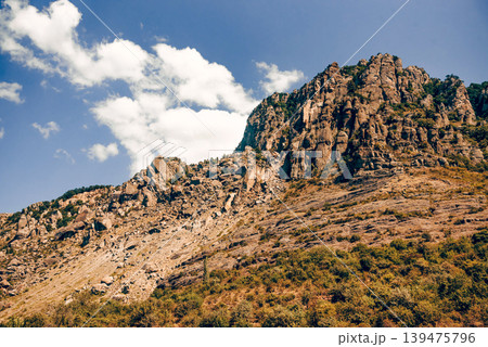 Landscape of Crimea mountains, mountain range in haze summer Valley of Ghosts Landscape of Crimea mountains, mountain range in haze summer Valley of Ghosts 139475796