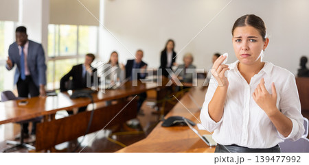 Devastated millennial white brunette female worker being fired 139477992