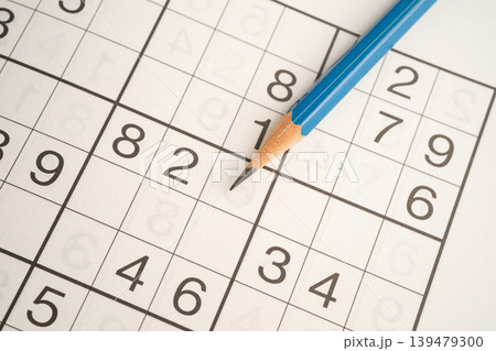 Sudoku puzzle game playing to challenge brain. 139479300