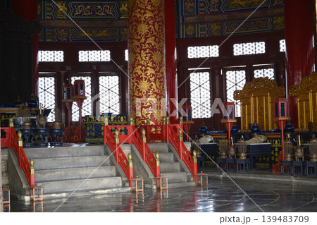 Interior of ancient Temple of Heaven in Beijing, China, with red column decorated by golden pattern Interior of ancient Temple of Heaven in Beijing, China, with red column decorated by golden pattern 139483709