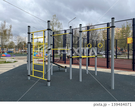 Outdoor street workout and playground equipment in residential area 139484071