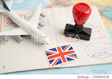 UK United Kingdom flag with passport and airplane for travel. 139484538