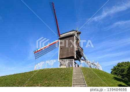 Traditional wooden windmill in Medieval Old Town and UNESCO World Culture Heritage site of Bruges in West Flanders, Belgium Traditional wooden windmill in Medieval Old Town and UNESCO World Culture Heritage site of Bruges in West Flanders, Belgium 139484698
