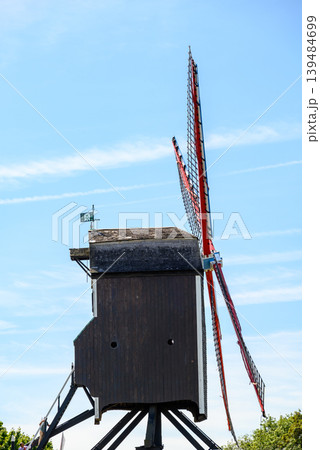 Traditional wooden windmill in Medieval Old Town and UNESCO World Culture Heritage site of Bruges in West Flanders, Belgium Traditional wooden windmill in Medieval Old Town and UNESCO World Culture Heritage site of Bruges in West Flanders, Belgium 139484699