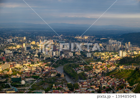 Panoramic aerial cityscape sunset view of Tbilisi, the capital of Georgia Panoramic aerial cityscape sunset view of Tbilisi, the capital of Georgia 139485045