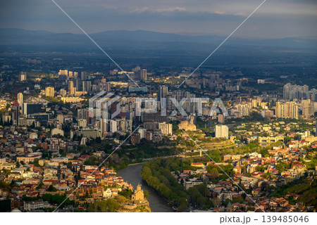 Panoramic aerial cityscape sunset view of Tbilisi, the capital of Georgia Panoramic aerial cityscape sunset view of Tbilisi, the capital of Georgia 139485046