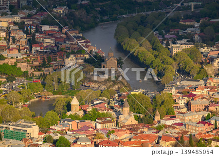 Panoramic aerial cityscape sunset view of Tbilisi, the capital of Georgia Panoramic aerial cityscape sunset view of Tbilisi, the capital of Georgia 139485054