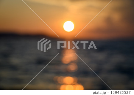 Soft Focus Ocean Sunset with Golden Sun Reflection Soft Focus Ocean Sunset with Golden Sun Reflection 139485527