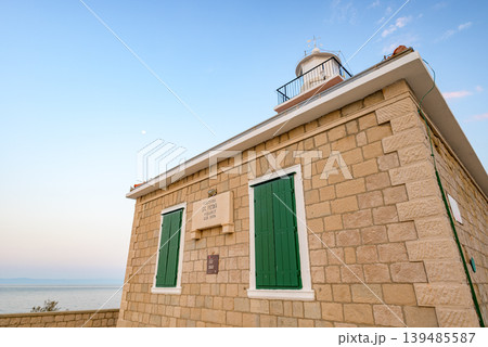 Stone St. Peter lighthouse on Adriatic sea in Makarska riviera in Croatia 139485587