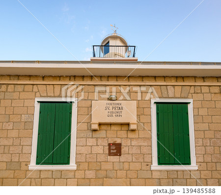 Stone St. Peter lighthouse on Adriatic sea in Makarska riviera in Croatia 139485588