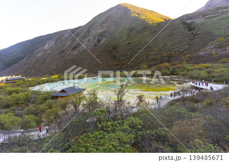 Beautiful view of Multi-Colored Pool in Huanglong National Park, famous for its colorful pools formed by calcite deposits in Sichuan, China. 139485671