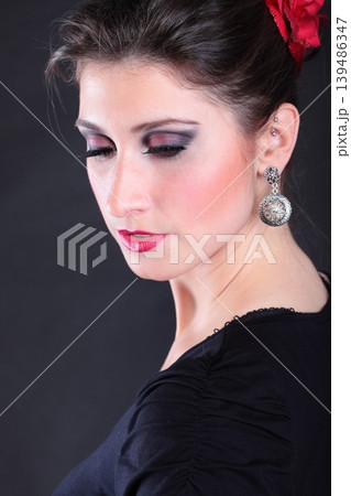 closeup portrait of flamenco dancer fan 139486347