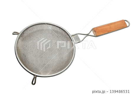 Stainless steel colander with a wooden handle. 139486531