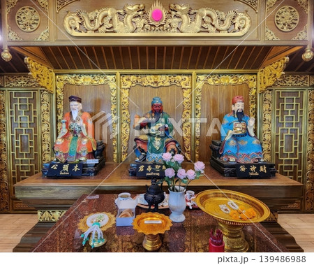 Ornate Chinese Altar with Guan Yu and Deity Statues on Golden Shrine 139486988