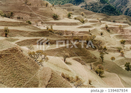 Landscape of Dagestan mountains, mountain range in haze summer Russia Landscape of Dagestan mountains, mountain range in haze summer Russia 139487934