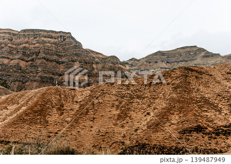Landscape of Dagestan mountains, mountain range in haze summer Russia Landscape of Dagestan mountains, mountain range in haze summer Russia 139487949