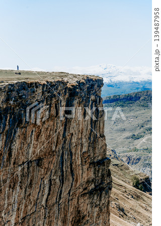 Landscape of Dagestan mountains, mountain range in haze summer Russia Landscape of Dagestan mountains, mountain range in haze summer Russia 139487958