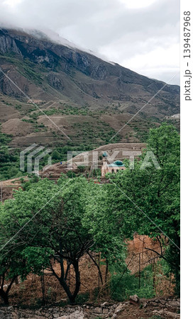 Landscape of Dagestan mountains, mountain range in haze summer Russia Landscape of Dagestan mountains, mountain range in haze summer Russia 139487968