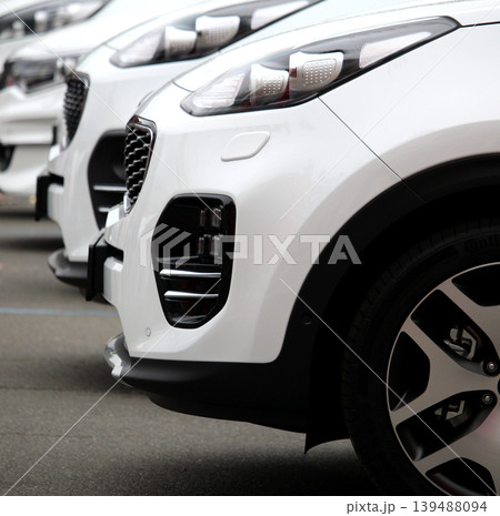 White car lined up on the asphalt stock photo 139488094