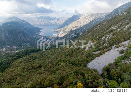 View from cable car to Boka Kotor Bay, large tourist liner parked among mountain 139488115
