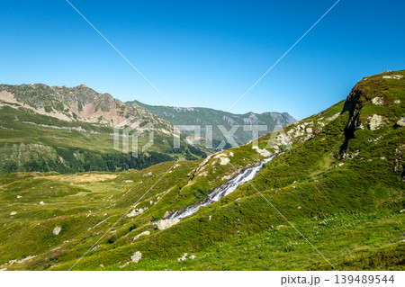 Alpine stream in Les Contamines Montjoie French Alps Alpine stream in Les Contamines Montjoie French Alps 139489544