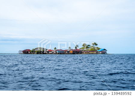 Pulau Papan Bajau village on Malenge Island, Togian archipelago, Sulawesi, Indonesia Pulau Papan Bajau village on Malenge Island, Togian archipelago, Sulawesi, Indonesia 139489592