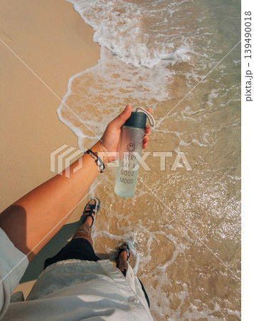 Walking on Shore with Water Bottle POV 139490018