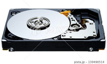a computer's hard disk HDD data storage drive without a shield isolated in a white background shows magnetic disc and electronic parts inside a computer's hard disk HDD data storage drive without a shield isolated in a white background shows magnetic disc and electronic parts inside 139490514