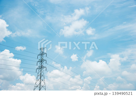a big electric post with cloudy sky a big electric post with cloudy sky 139490521