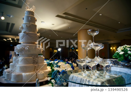small tower of champagne's glass in wedding reception party small tower of champagne's glass in wedding reception party 139490526