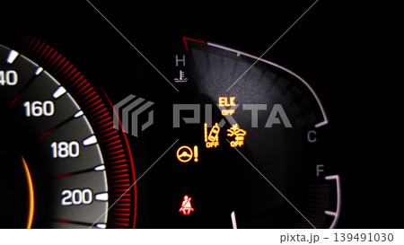 Car dashboard. Modern digital car dashboard with illuminated speedometer warning icons fuel gauge driver assistance and other indicators. Advanced automotive instrument cluster tech in future vehicle Car dashboard. Modern digital car dashboard with illuminated speedometer warning icons fuel gauge driver assistance and other indicators. Advanced automotive instrument cluster tech in future vehicle 139491030