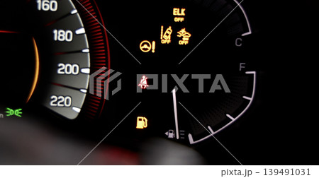 Car dashboard. Modern digital car dashboard with illuminated speedometer warning icons fuel gauge driver assistance and other indicators. Advanced automotive instrument cluster tech in future vehicle Car dashboard. Modern digital car dashboard with illuminated speedometer warning icons fuel gauge driver assistance and other indicators. Advanced automotive instrument cluster tech in future vehicle 139491031