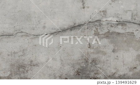 Gray Concrete Wall Texture with Natural Cracks Background Gray Concrete Wall Texture with Natural Cracks Background 139491629
