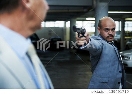 Car park, crime and business man with gun point robbery, kidnap or ransom, danger or threat. Violence, gangster or mature male entrepreneur with fear, stress and anxiety for mafia, mob or terror Car park, crime and business man with gun point robbery, kidnap or ransom, danger or threat. Violence, gangster or mature male entrepreneur with fear, stress and anxiety for mafia, mob or terror 139491710