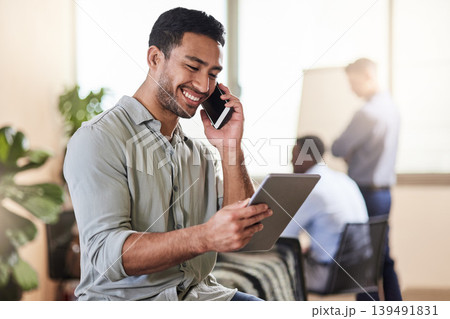 Tablet, phone call and business man in office for real estate sale, deal negotiation and feedback. Technology, smile and person in workplace for communication, property investment and coworking 139491831