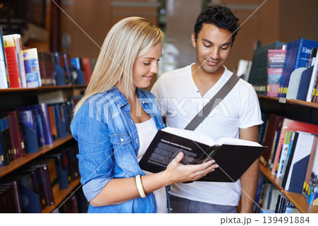 Teamwork, book or students reading in a library at university, college or school campus for education. Bookshelf, learning or young people with scholarship studying knowledge, research or information Teamwork, book or students reading in a library at university, college or school campus for education. Bookshelf, learning or young people with scholarship studying knowledge, research or information 139491884