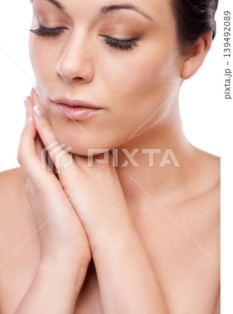 Makeup, beauty and woman in studio for cosmetic care, wellness and shine closeup. Makeover, face and calm female model with glow, dermatology or soothing skin treatment, pamper and soft glam results Makeup, beauty and woman in studio for cosmetic care, wellness and shine closeup. Makeover, face and calm female model with glow, dermatology or soothing skin treatment, pamper and soft glam results 139492089