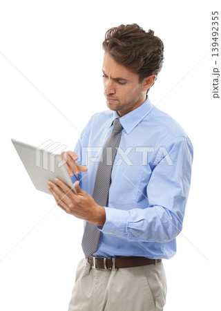Businessman, tablet and thinking in research, schedule or communication against a white studio background. Man or employee on technology for online search, networking or social media in planning Businessman, tablet and thinking in research, schedule or communication against a white studio background. Man or employee on technology for online search, networking or social media in planning 139492355